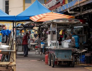 Families Hard at Work at Pulau Tikus Market